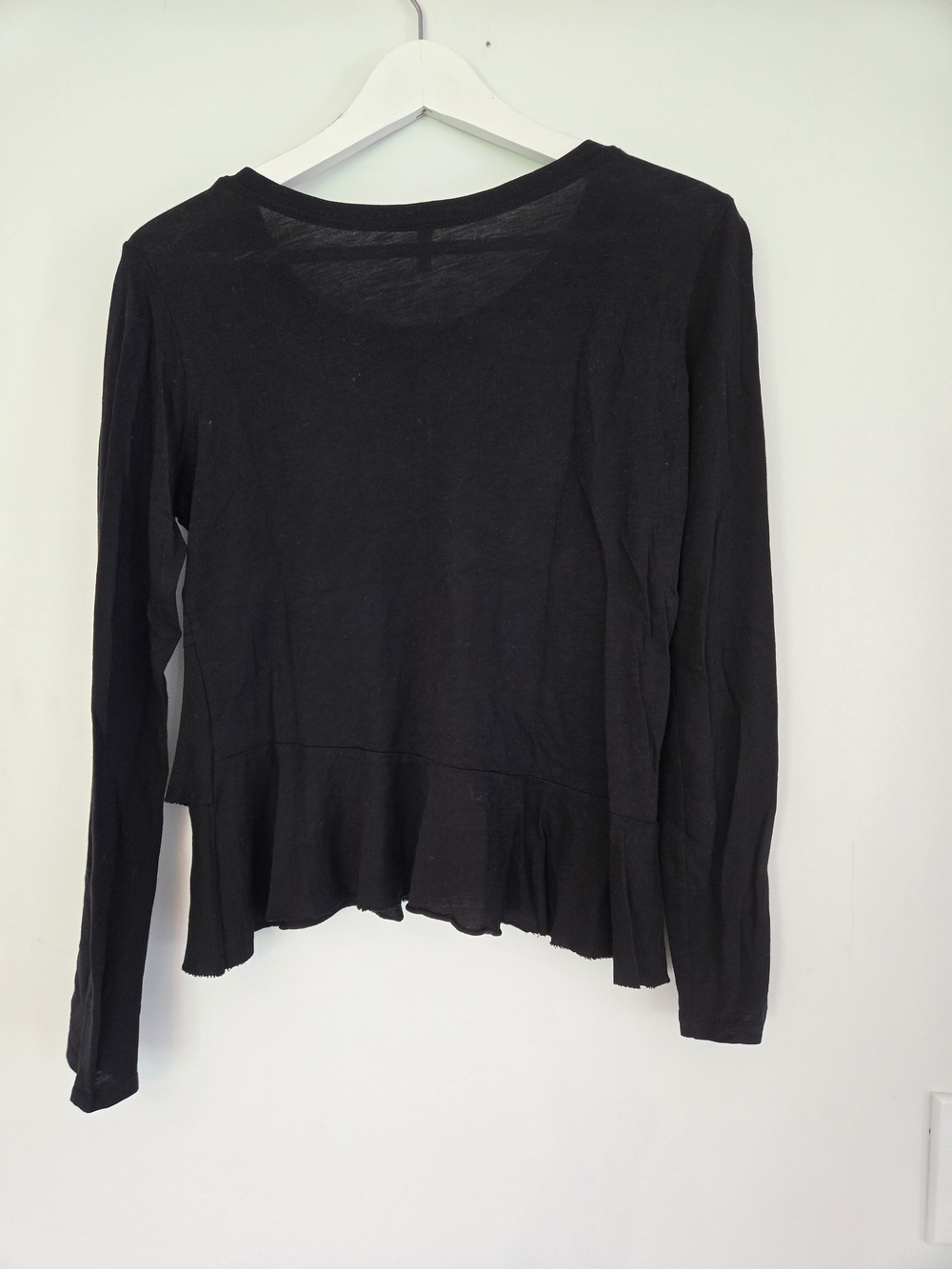 Women's Black Long Sleeve Ruffle Hem Top